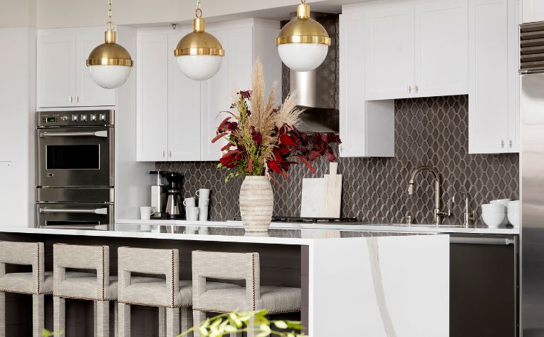 white kitchen with bold backsplash designed by Martha O'Hara Interiors